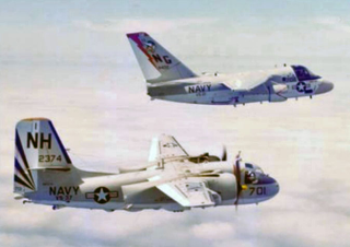 An S-3 Viking flies alongside a Grumman S-2 Tracker, the aircraft it replaced, in 1976 (US Navy)